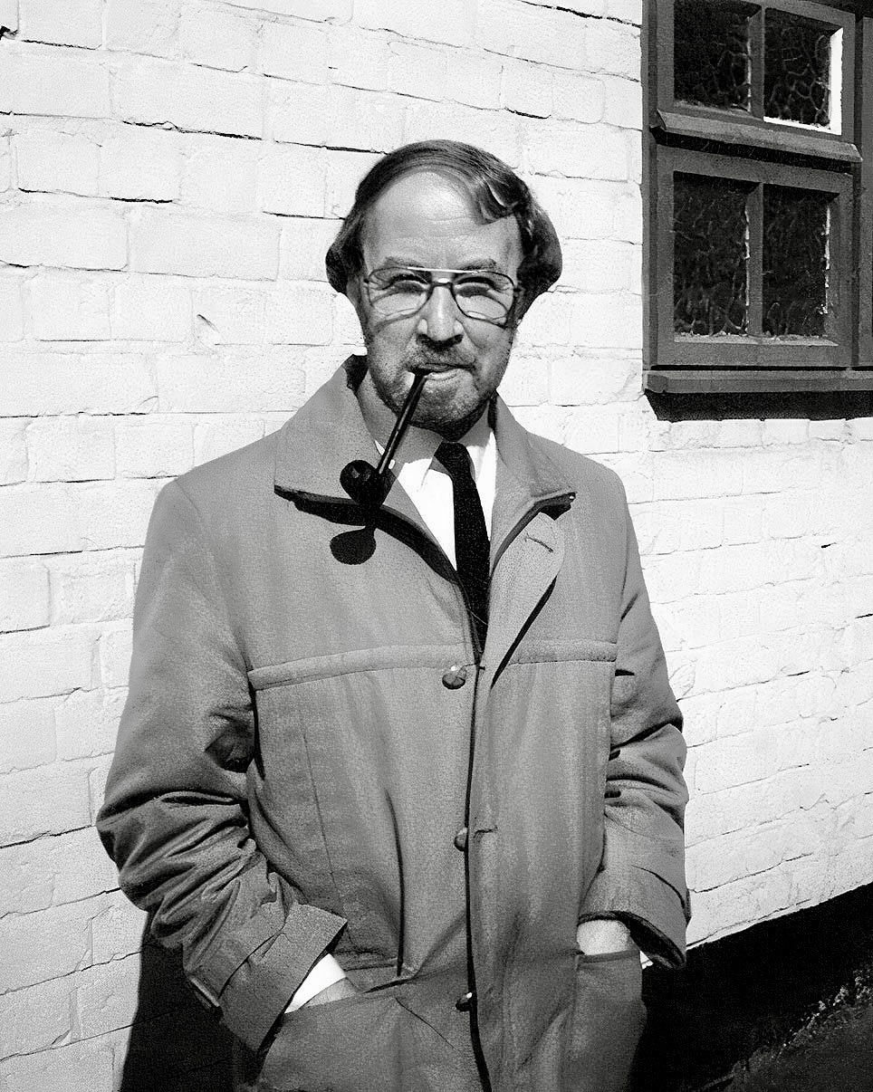 Early Days of Cliff Bradley Smoking a Pipe