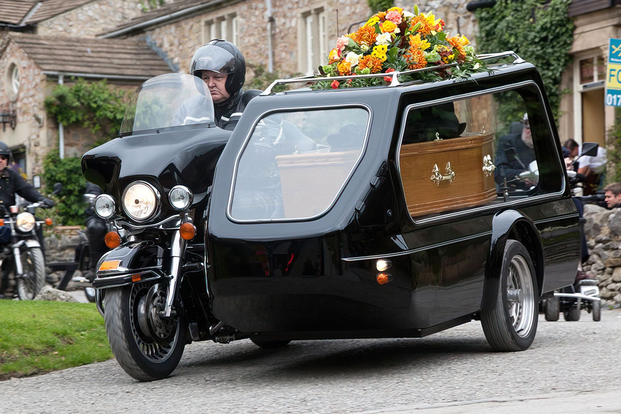 Motorcycle Funeral Hearse Leads the Procession